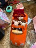 Calico Critters Convertible Car in bright orange with animal family riding inside