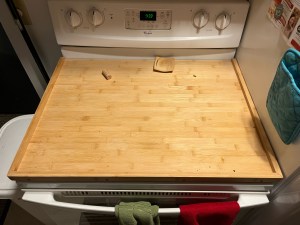 Wooden stove top cover