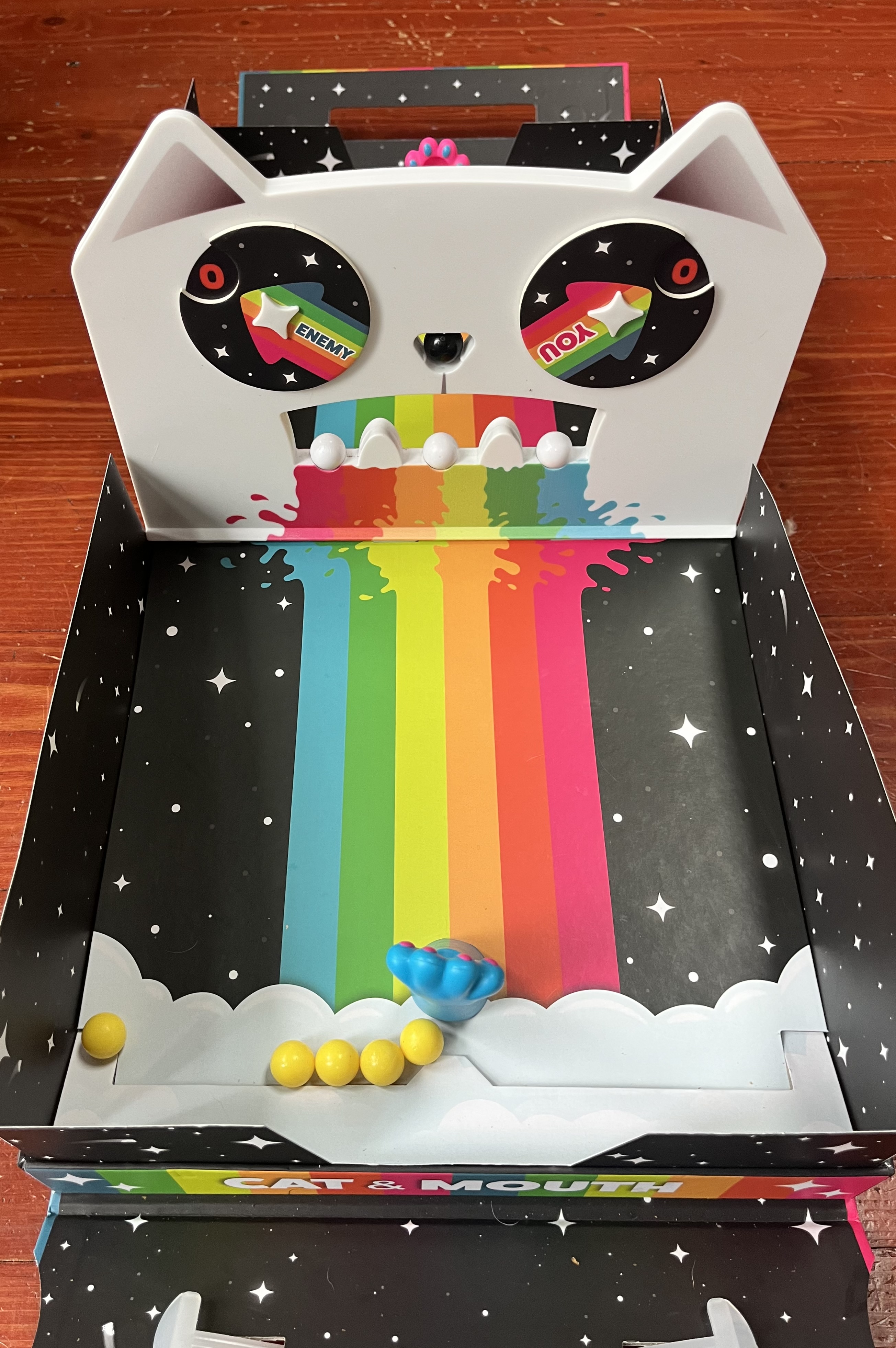 A Game of Cat and Mouth pinball paws game in a box set up