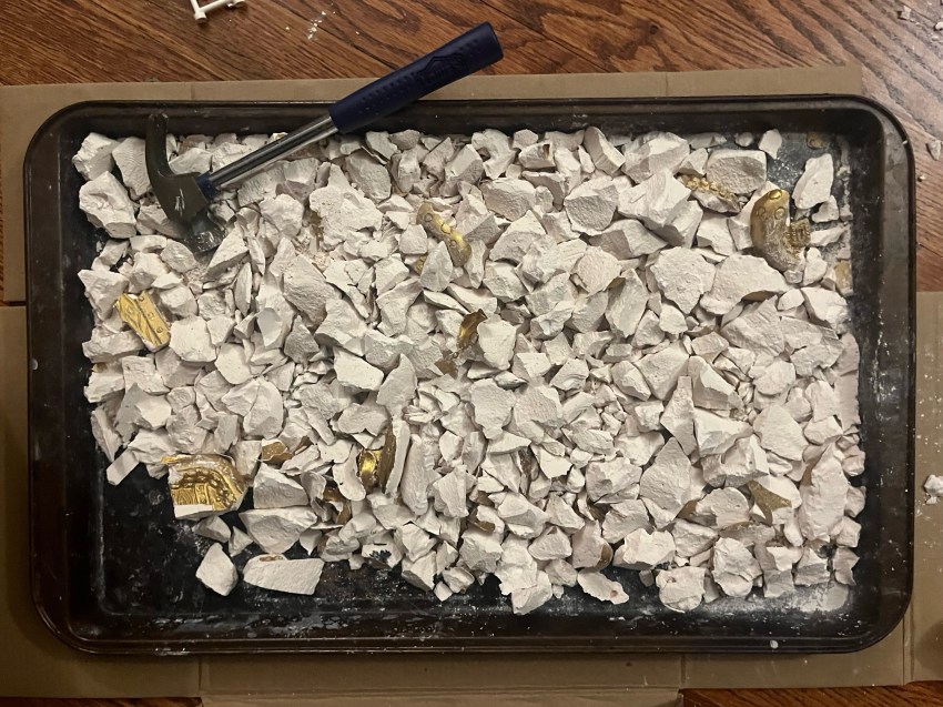 Plaster rubble from MindWare Dig It Up Giant Pirate Discovery treasure chest