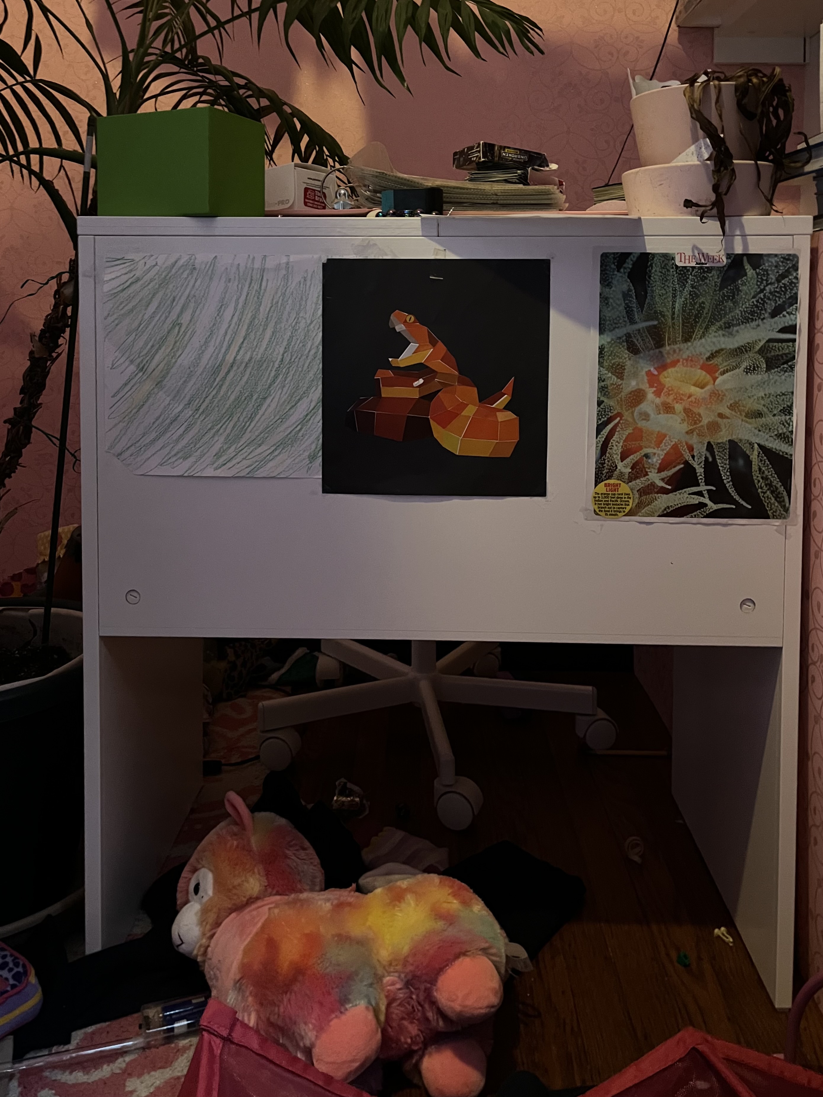 IKEA Brimnes Dressing Table used as desk with art and magazie pages